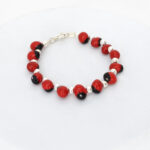 Pulsera protectora huayruros billa plata