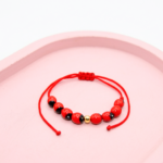 Pulsera protectora Huayruros y billa Oro