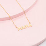 Cadena dije "MAMÁ" lineado Acero