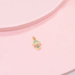 Dije Niña con 2 colitas y zircones