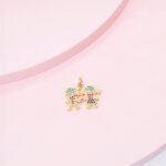 Dije Niño y niña de la mano