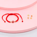 Pack Newborn estrella box Oro y pulsera ojito