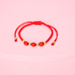 Pulsera protectora huayruros con tejido oro